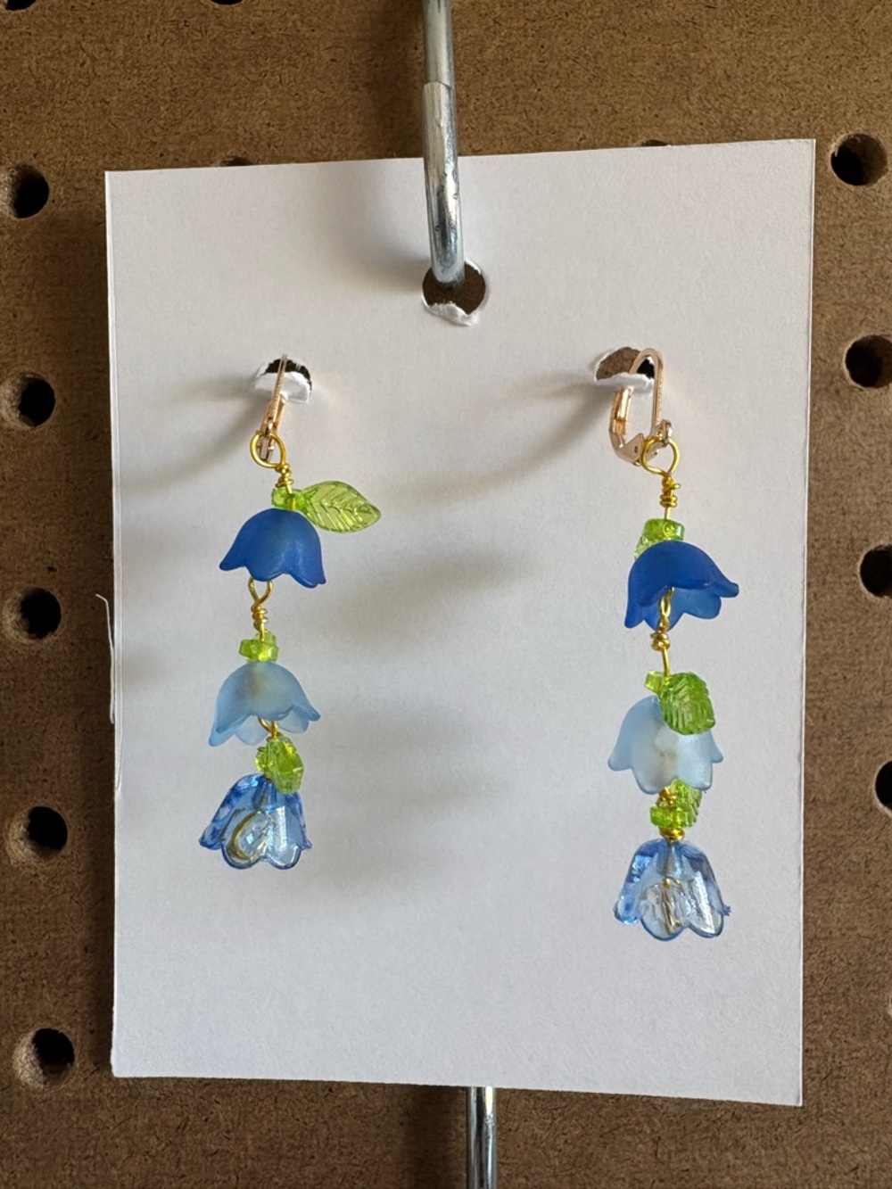 Hand Crafted Blue and Light Blue Floral Drop Earrings with Green Leaf Accents